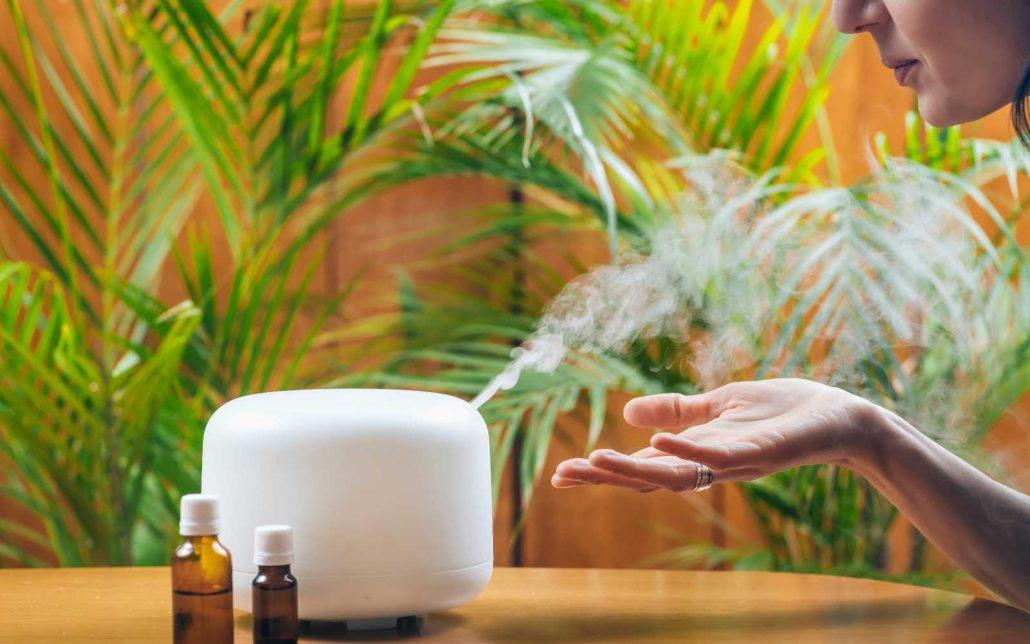 inhaling antiviral essential oils with diffuser
